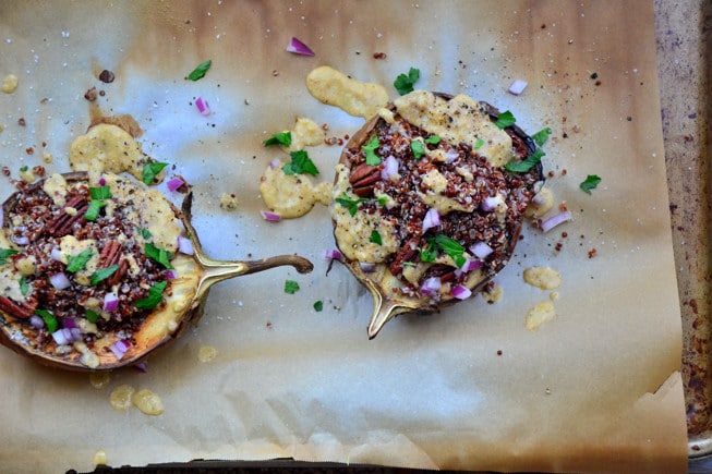 Vegetarian Stuffed Eggplant is a delicious appetizer stuffed with red quinoa, parsley and an incredible sauce on top.